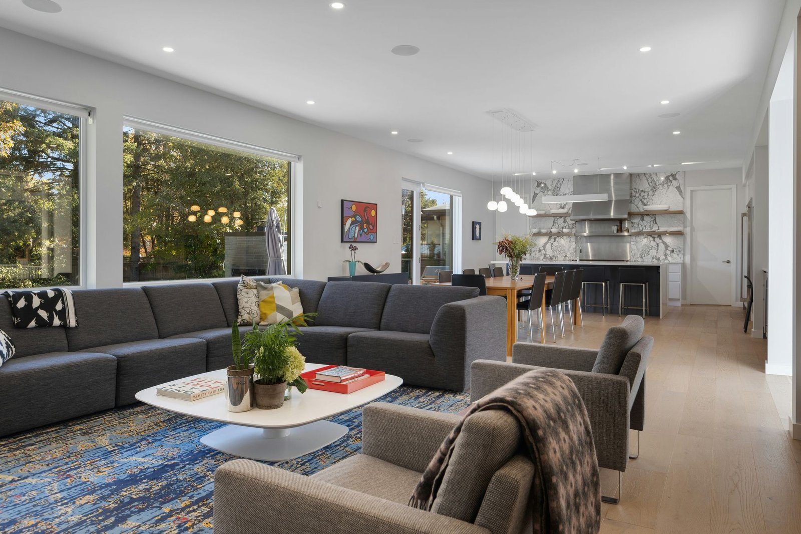 Bright, open-plan residential living space by HN Designs